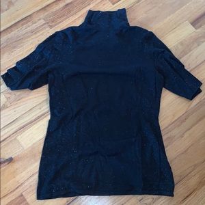 Sparkly black turtle neck w/ cut out back